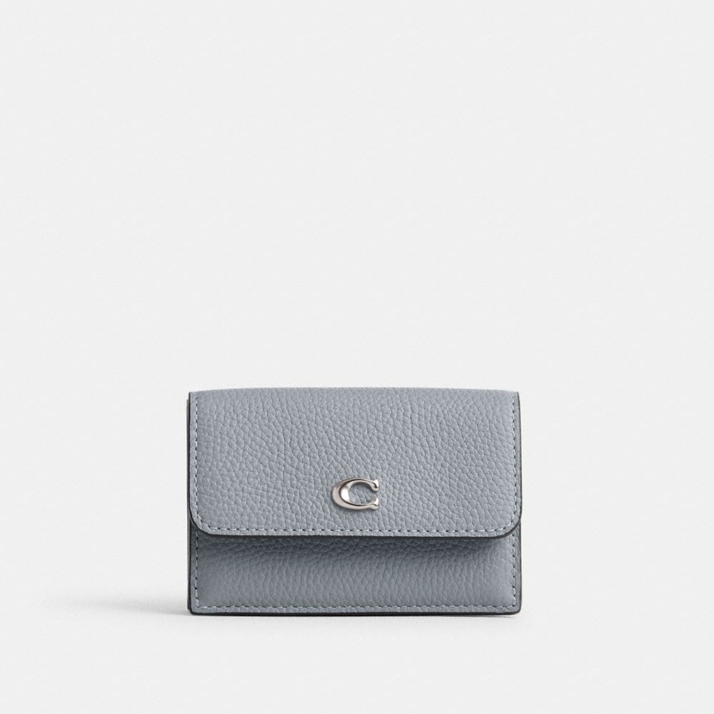 Discover the Coach Essential Mini Trifold Wallet: A Stylish and Functional Accessory