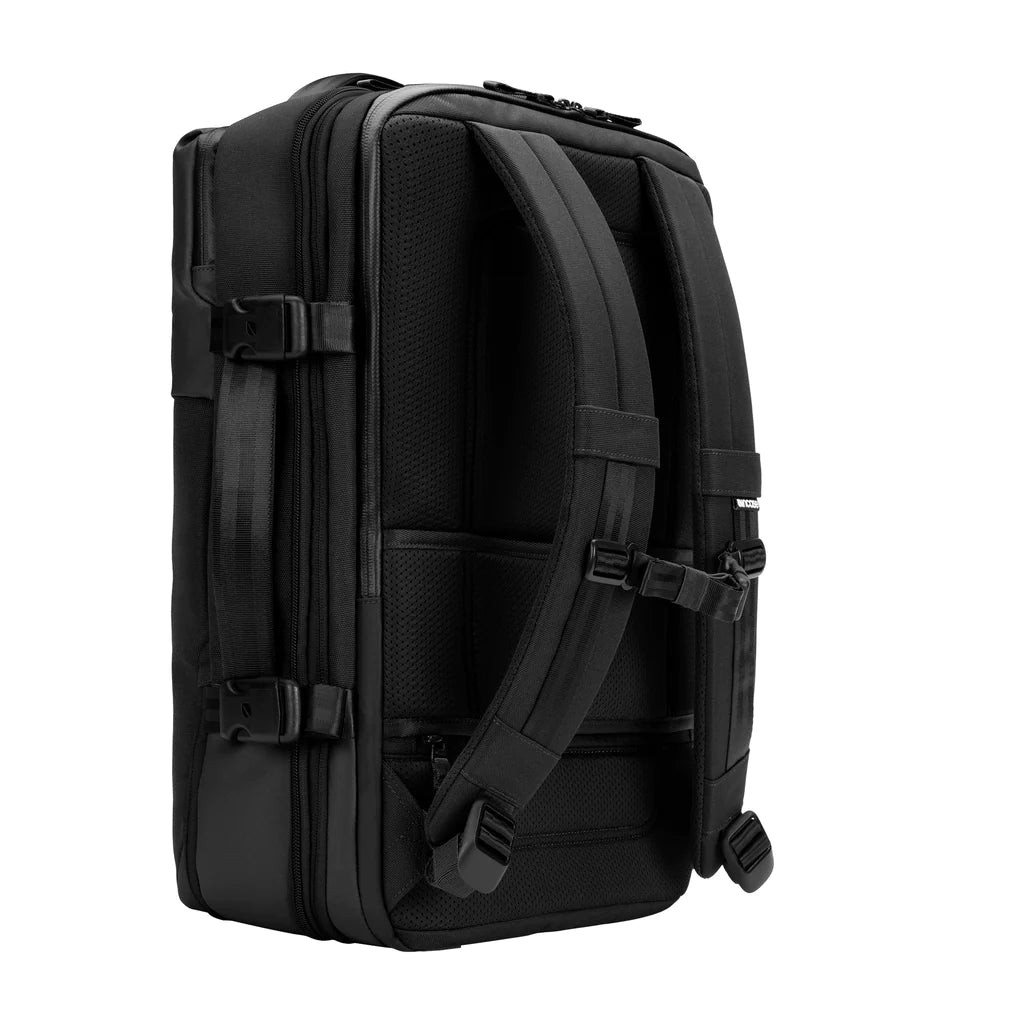 Minimalist laptop backpack for work and travel with luggage sleeve