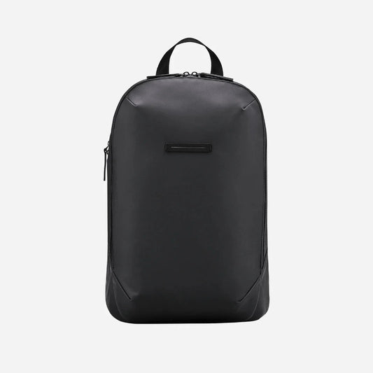 Best minimalist waterproof backpack with luggage sleeve for work and travel 