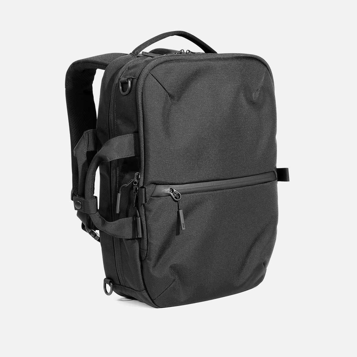 Convertible waterproof laptop backpack for work and travel with water bottle pocket