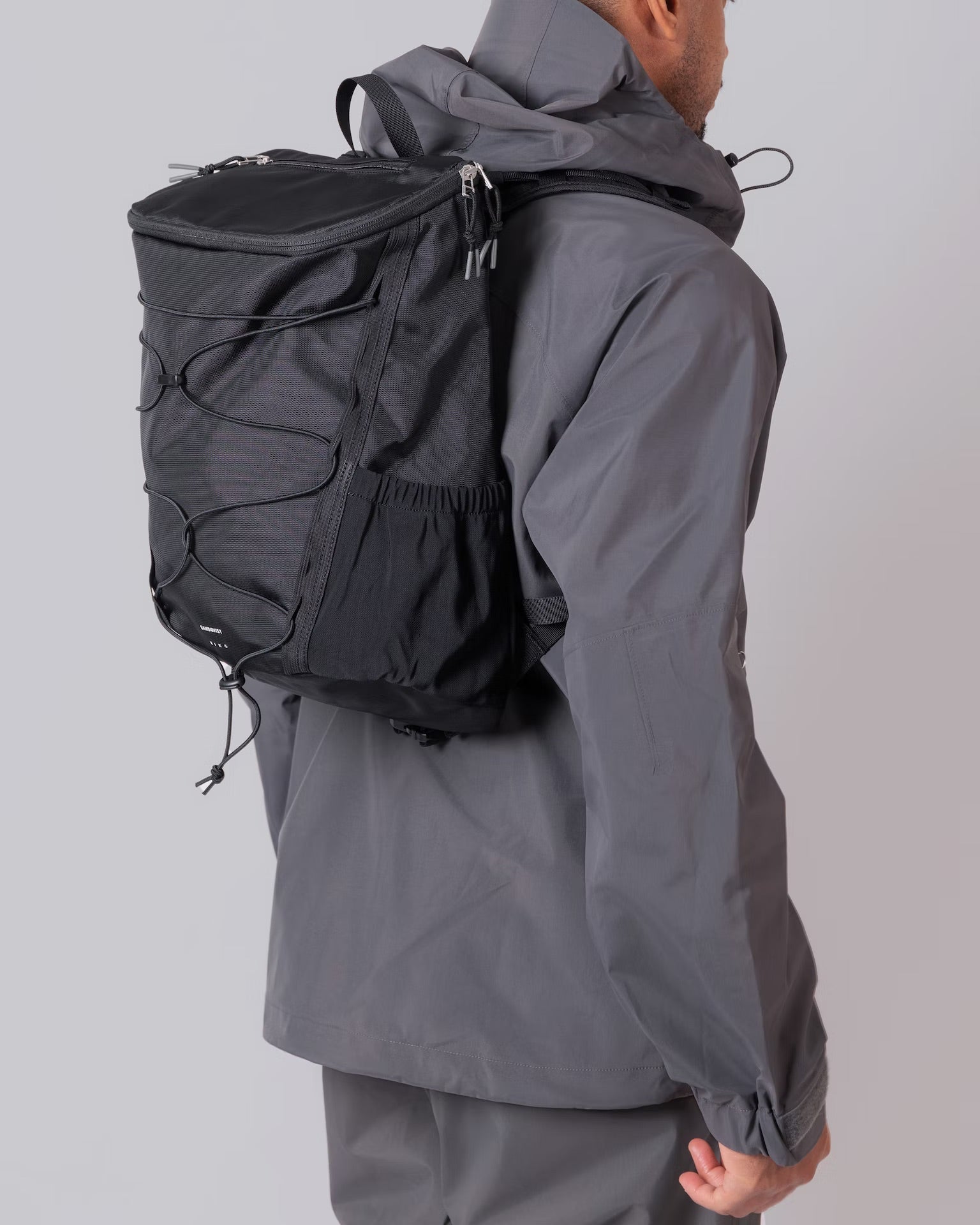 Waterproof backpack for work and travel with water bottle pocket