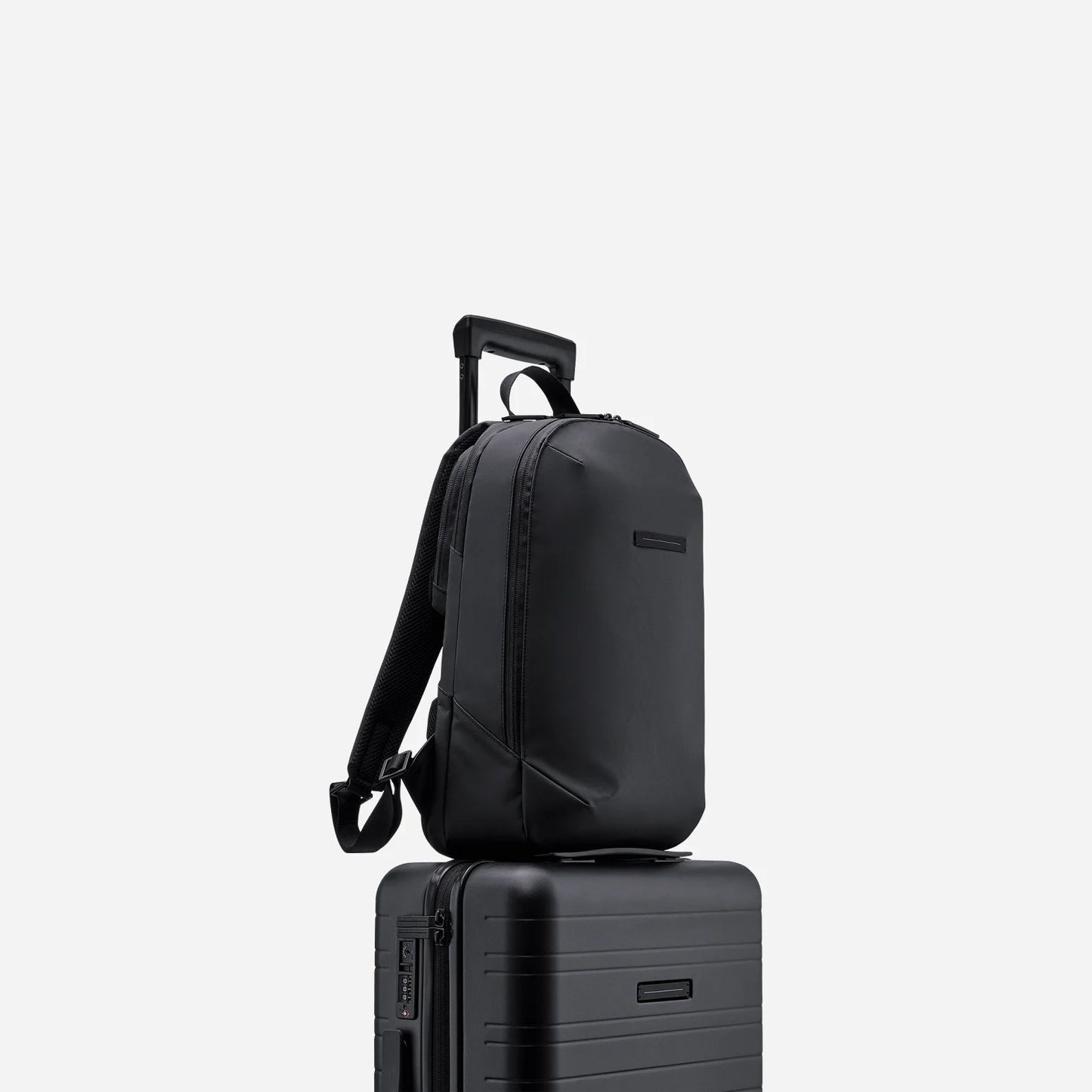 Best minimalist waterproof backpack with luggage sleeve for work and travel 